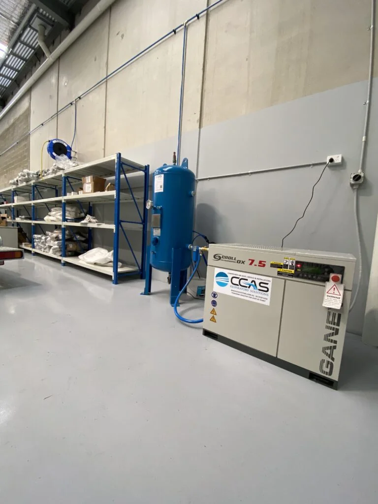 Compressed air pipe system complete with macnaught retracta hose reels and Kaishan Australia air compressor package.