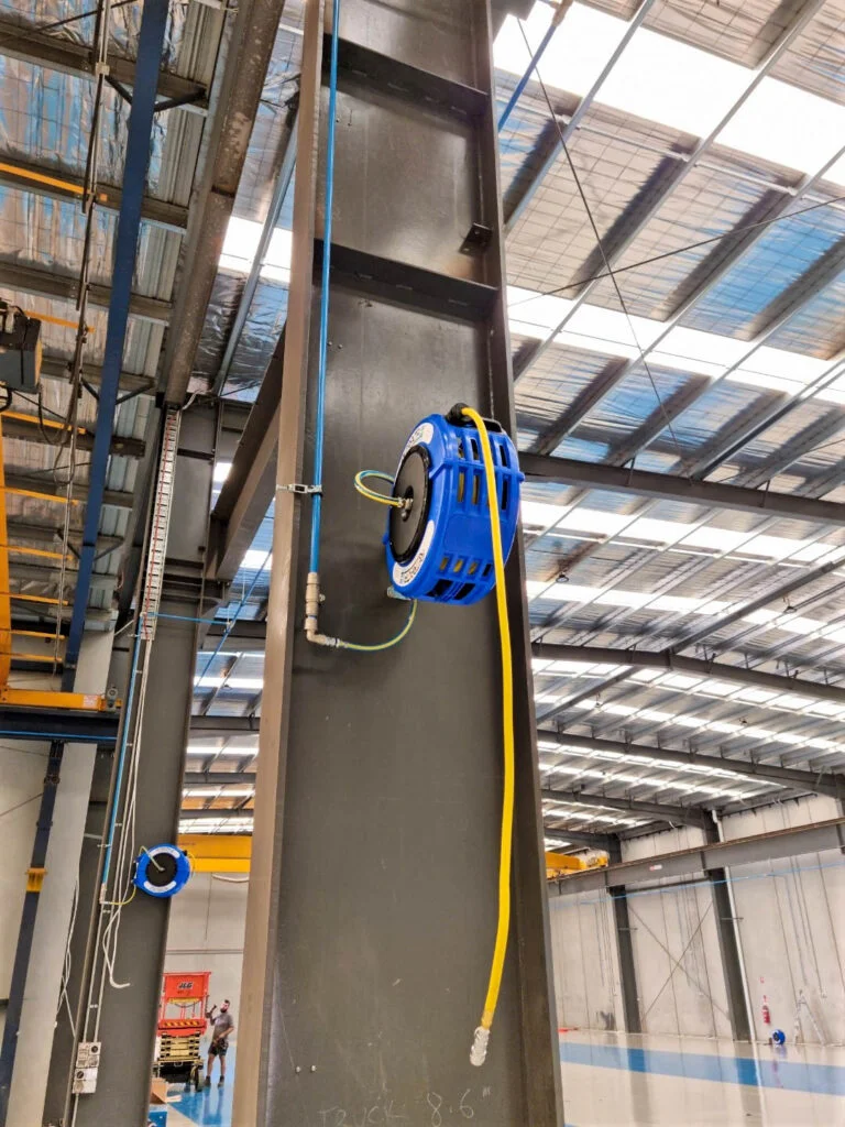 Aluminium ring main complete with Macnaught Retracta air hose reels.